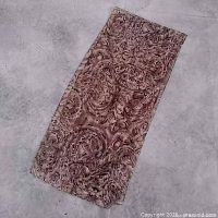 Scarf laid flat showing overall pattern