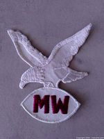 Front view of full patch showing eagle and MW letters