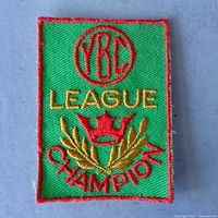 Front view of embroidered YBC League Champion patch