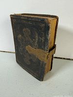 Front and clasp of antique leather photo album