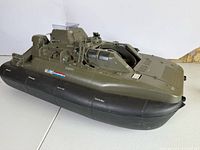 Left side profile of GI Joe hovercraft showing decal and structural details