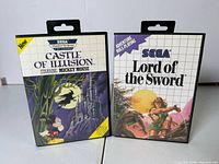 Front view of both Sega Master System game cases