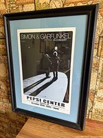 Full view of framed poster showing artwork and frame