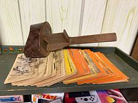 Viewer resting on stack of stereograph cards