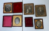 Eight case halves and four ambrotypes arranged on table