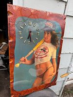 Full view of stained wood clock plaque with Yankees model image and Roman numeral dial