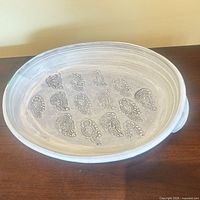 Top view showing overall oval bowl and paisley interior design