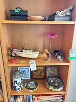 Three shelves showing all assorted items together