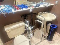 Overall lot showing support frames, canes, weights, BP monitors, heating pad