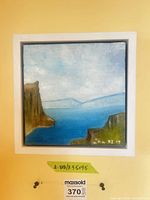 Front view of square framed painting