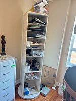 Front view showing shelves filled with items (contents not included)