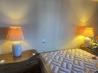 Both lamps on nightstands showing size and matching style