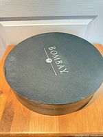 Closed round Bombay box