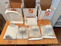 Overview of all ceramic pieces, plastic rollers and boxes