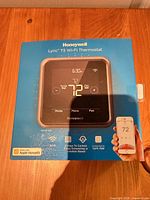 Front of retail box showing Honeywell Lyric T5 Wi-Fi Thermostat