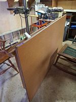 Top view of rectangular tabletop leaning vertically