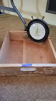Wooden box and nautical thermometer together