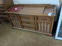 Front view of Magnavox console stereo showing entire cabinet and speaker panels