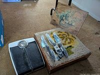 Scale, shoe horns, plaque, rug step overview