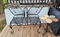 Bench and side table together on deck