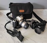 Overall lot: Pentax MZ-30 SLR, Nikon Coolpix L800, Pentax camera bag