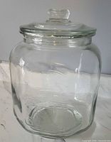 Full view of clear glass Planters jar with lid