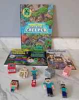 All books, figures and keychains grouped