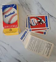 Cards spread with rules card visible