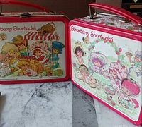 Front view showing both lunch box graphics