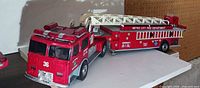 Full view of articulated ladder fire truck model