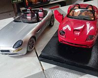 BMW Z8 and Ferrari 550 Barchetta models front three-quarter view