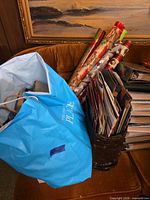 Overall lot showing rolls and bags on couch