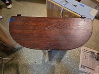 Top view showing half-moon shape and wood grain