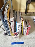 Front view of the lined-up books, magazines and trading card bundle