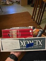 Xerox box containing multiple DVD cases, Marple box spine visible