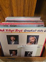 Front view showing Oak Ridge Boys Greatest Hits 2 and stack behind