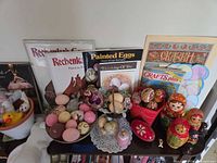 Overall lot: eggs, Matryoshka dolls, books, plush toys