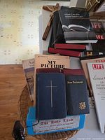 Basket with pocket New Testament, prayer book, My Picture Story Bible, The Holy Land slide box, Life magazine