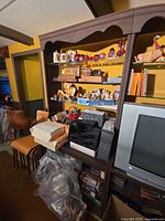 Front view showing entire wall unit with shelves and backing