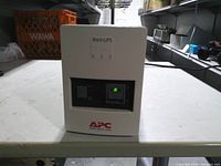 Front view showing model label, power switch, indicator light