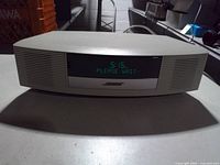 Front view showing display and speaker grilles