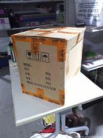 Sealed outer cardboard shipping box
