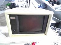 Front view of Compaq Deskpro CRT monitor showing screen, bezel, logo and control knob
