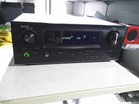 Front view showing display, controls, power indicator