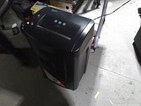 Full view of shredder showing overall condition and exterior