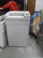 Full front view of the GBC Shredmaster 7120S shredder with cabinet door closed