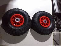 Both tires side by side showing overall condition and tread