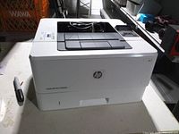 Front angled view of HP LaserJet Pro M402n printer