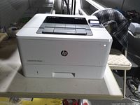 Front view of HP LaserJet Pro M402n printer