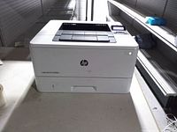 Front and top view of HP LaserJet Pro M402n printer